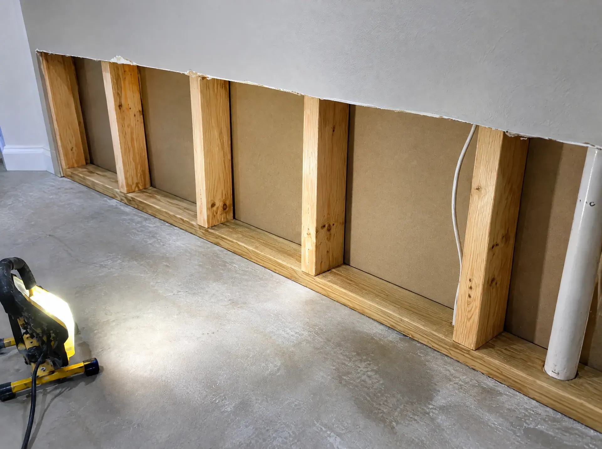 After: Mold behind a finished basement wall