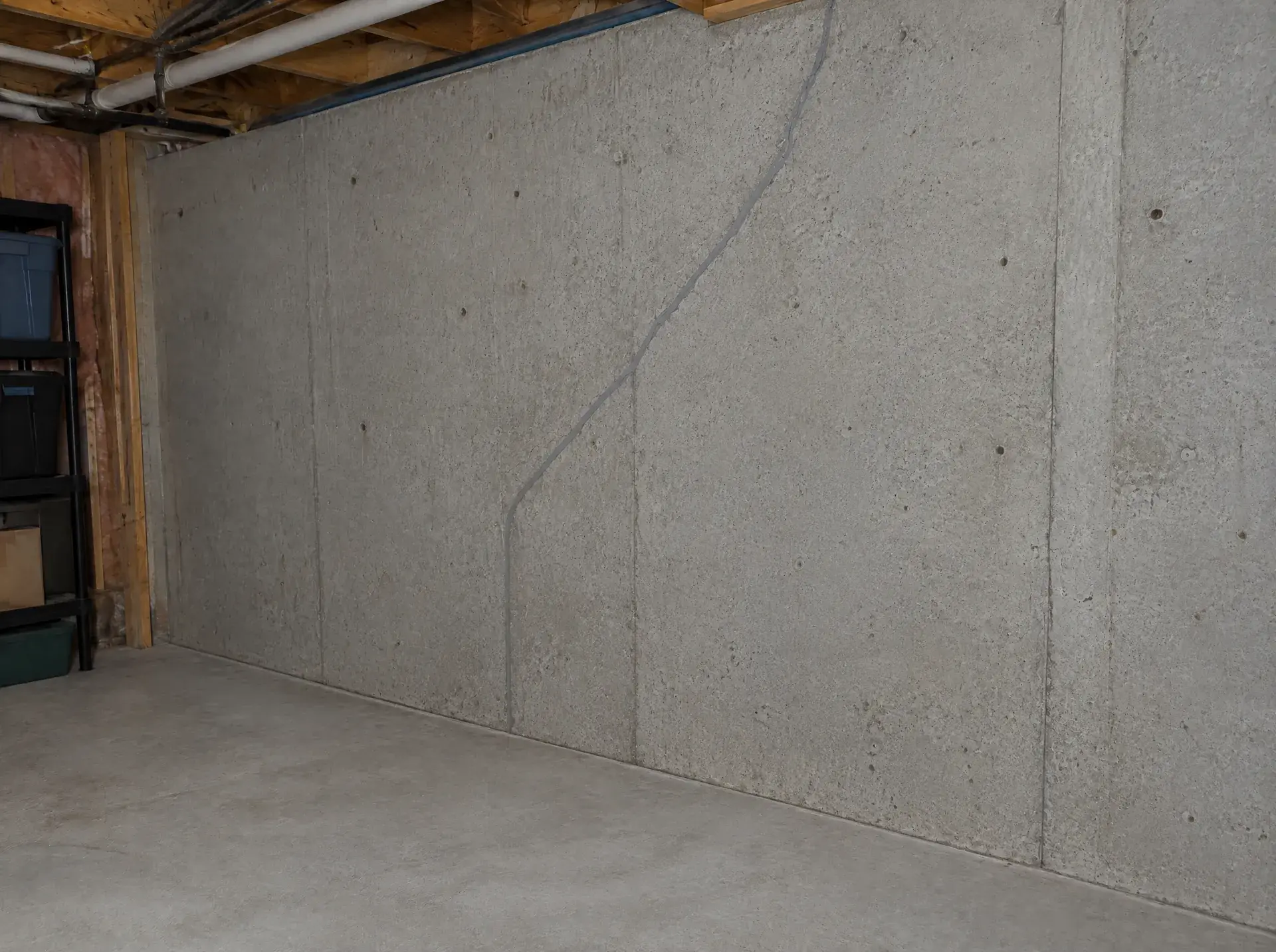 After: Leaking basement wall, rear elevation